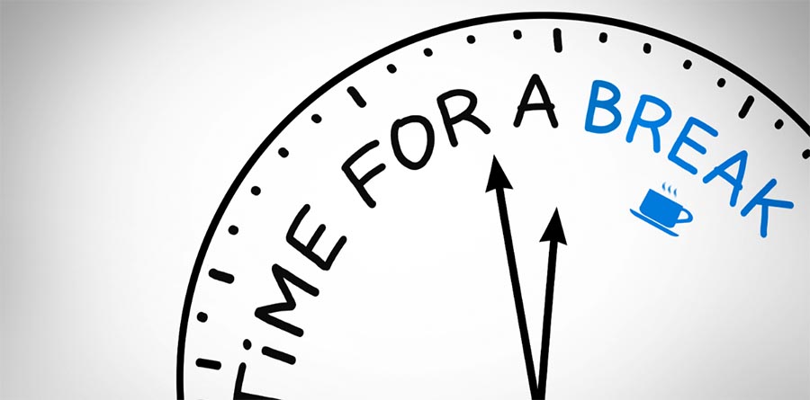 Part of a drawing of a clock that says, "Time for a break".